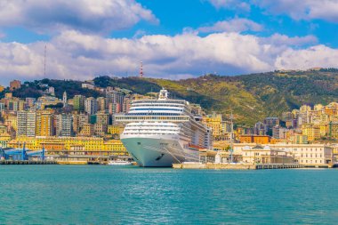 GENOA, ITALY, MARCH 13, 2016: view of a cruise ship anchoring in the port of genoa in italy.