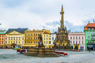 OLOMOUC, CZECH REPUBLIC, APRIL 16, 2016: View of the upper square in the czech city olomouc dominated by the holy trinity column enlisted in the unseco world heritage list.
