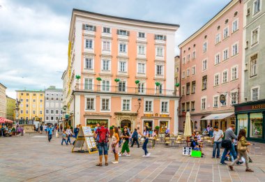 SALZBURG, AUSTRIA, JULY 3, 2016: People are strolling on the alter markt square in the Austrian city Salzburg.