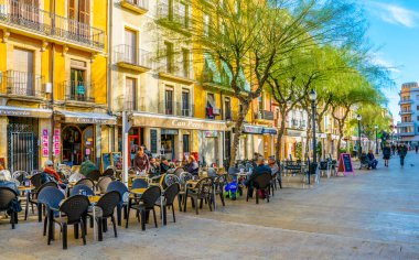 TARRAGONA, SPAIN, DECEMBER 29, 2015: Place de la font is one of the main squares of spanish city Tarragona which is popular place for drinking a cup of coffee or enjoying nightlife.
