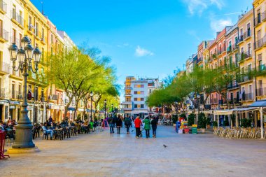 TARRAGONA, SPAIN, DECEMBER 29, 2015: Place de la font is one of the main squares of spanish city Tarragona which is popular place for drinking a cup of coffee or enjoying nightlife.