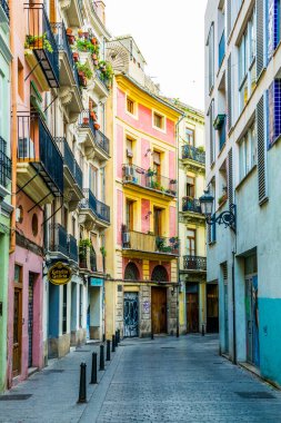 VALENCIA, SPAIN, DECEMBER 30, 2015: view of a narrow street situated in the historical centre of spanish city Valencia