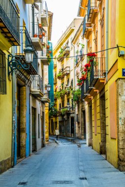 VALENCIA, SPAIN, DECEMBER 30, 2015: view of a narrow street situated in the historical centre of spanish city Valencia