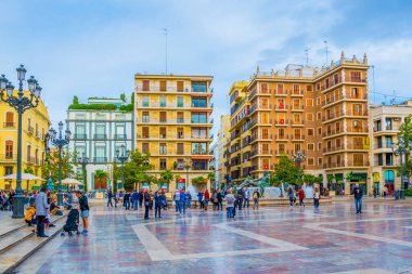 VALENCIA, SPAIN, DECEMBER 30, 2015: Square of Saint Mary's with Valencia Cathedral Temple, Basilica de la nuestra senora de los desamparados and the rio tura fountain in old town.