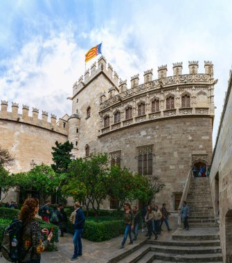 VALENCIA, SPAIN, DECEMBER 30, 2015: people are walking through the inner courtyard of the Old Silk Exchange (Lonja de la Seda), Valencia, Spain. UNESCO World Heritage Site.