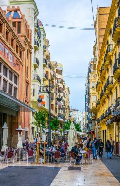 VALENCIA, SPAIN, DECEMBER 30, 2015: people are walking through carrer de ribera street situated in the historical centre of spanish city Valencia
