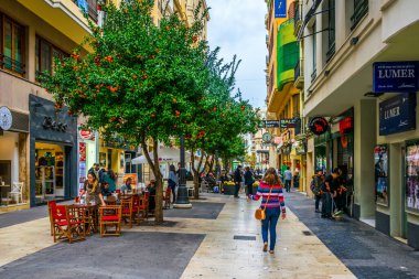 VALENCIA, SPAIN, DECEMBER 30, 2015: people are walking through carrer de ribera street situated in the historical centre of spanish city Valencia