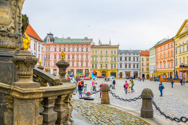 OLOMOUC, CZECH REPUBLIC, APRIL 16, 2016: View of the upper square in the czech city olomouc dominated by the holy trinity column enlisted in the unseco world heritage list.