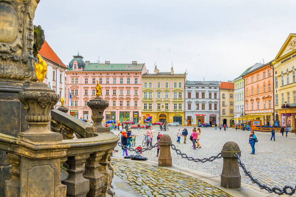 OLOMOUC, CZECH REPUBLIC, APRIL 16, 2016: View of the upper square in the czech city olomouc dominated by the holy trinity column enlisted in the unseco world heritage list.