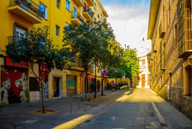 VALENCIA, SPAIN, DECEMBER 30, 2015: view of a narrow street situated in the historical centre of spanish city Valencia