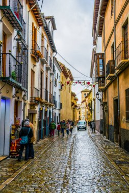GRANADA, SPAIN, JANUARY 3, 2016: View along the Carrera del Darro in the Albaicin quarter, Granada