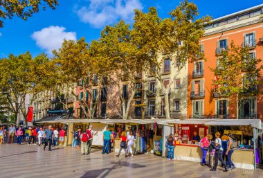 BARCELONA, SPAIN, OCTOBER 26,2014: People are strolling on the la rambla street in Barcelona.