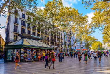 BARCELONA, SPAIN, OCTOBER 26,2014: People are strolling on the la rambla street in Barcelona.