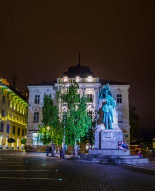 LJUBLJANA, SLOVENIA, JULY 29, 2015: night view of the preseren square in the slovenian capital ljubljana which is famous for triple bridge, franciscan cathedral and preseren memorial
