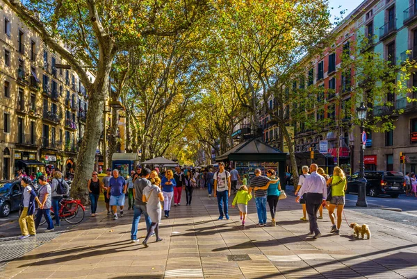 BARCELONA, SPAIN, OCTOBER 26,2014: People are strolling on the la rambla street in Barcelona.