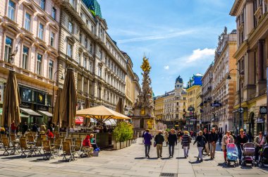 VIENNA, AUSTRIA, MAY 15, 2015. Tourists on foot Graben Street in Vienna. The population of Vienna makes 1,68 million people, Vienna is the largest on the population the city of Austria