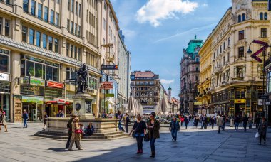 VIENNA, AUSTRIA, MAY 15, 2015. Tourists on foot Graben Street in Vienna. The population of Vienna makes 1,68 million people, Vienna is the largest on the population the city of Austria