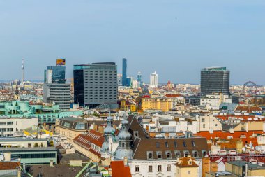 VIENNA, AUSTRIA, FEBRUARY 2, 2016: Aerial view of Vienna with Donauturm, prater and its riesenrad ferris wheel from top of the stephansdom cathedral.