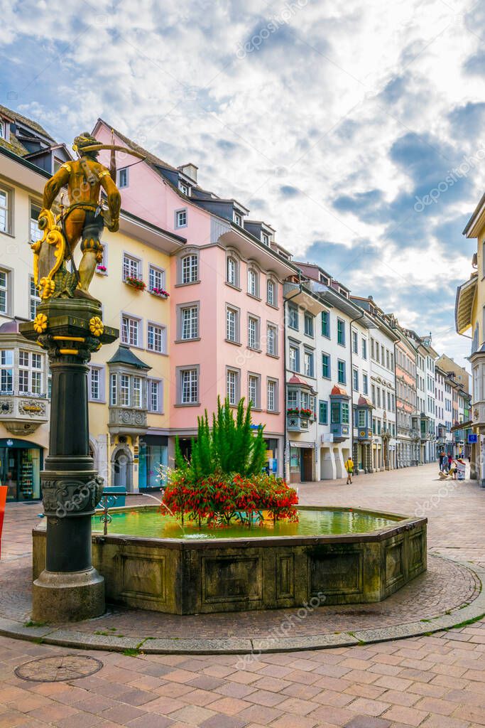 Statue of the swiss national hero Wilhelm Tell situated on the top of a fountain in Schaffhausen