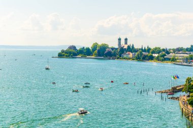 View of the schlosskirche church and lakeside promenade in Friedrichshafen, Germany
