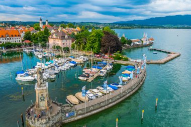 Aerial view of the german port Lindau including Mangturm tower and a lion statue