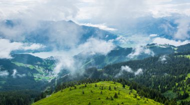 Aerial view of the zeller lake and zell am see town from the upper statioon of the schmittenhohe cable car in Austria.