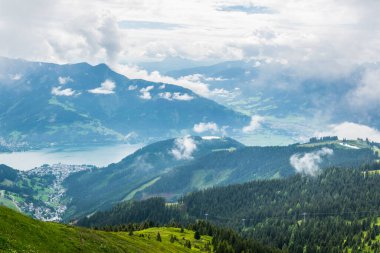 Aerial view of the zeller lake and zell am see town from the upper statioon of the schmittenhohe cable car in Austria.