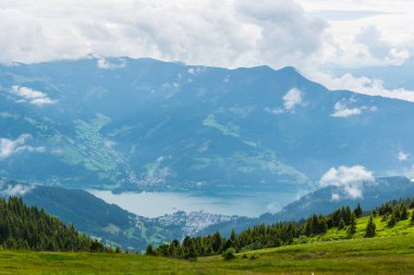 Aerial view of the zeller lake and zell am see town from the upper statioon of the schmittenhohe cable car in Austria.