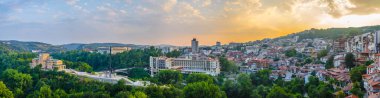Sunset panorama of Veliko Tarnovo with the State Art Gallery Boris Denev and the asenovtsi memoria