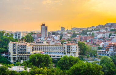 Sunset over traditional houses in the old town of Veliko Tarnovo, Bulgari