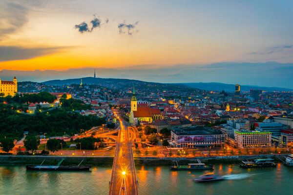 Panoramic view of Bratislava with the Castle, Saint Martin cathedral and Old Town at Sunset