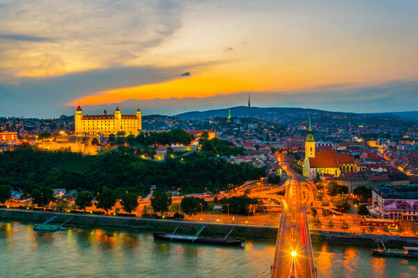 Panoramic view of Bratislava with the Castle, Saint Martin cathedral and Old Town at Sunset