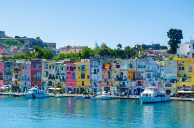 italain island procida is famous for its colorful houses and ancient fortress overlooking whole bay of naples.