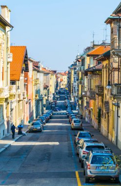 view of a narrow street in the italian city torino
