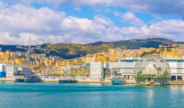 View of the port of genoa dominated by an aquarium and the biosphere green house designed by renzo piano