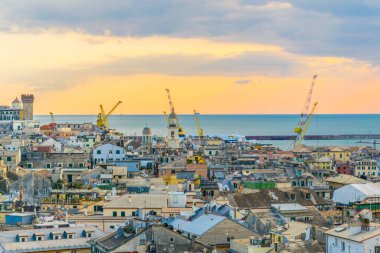 aerial view of the italian city genoa during sunset