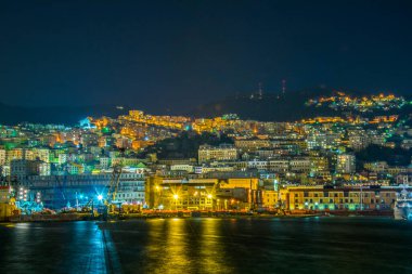 night view of the port of genoa in italy