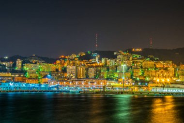 night view of the port of genoa in italy