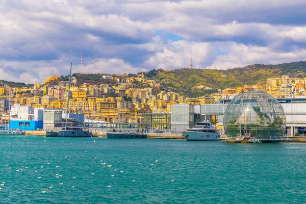 View of the port of genoa dominated by an aquarium and the biosphere green house designed by renzo piano