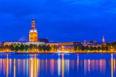 Susnset view of the Riga cathedral from the other side of the Daugava river, Latvia