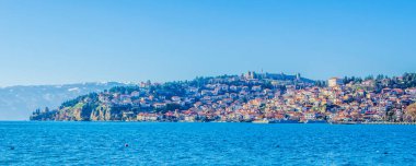 historical part of unesco listed town ohrid is located next to the ohrid lake and spread all over the hill with fortress of tzar samuel at the top.