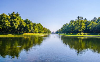 View of a lake situated inside of the nymphenburg palace complex in german city munich