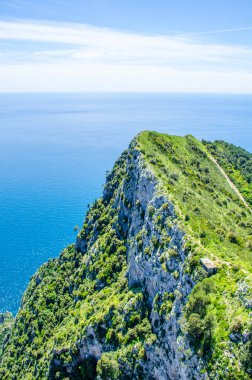aerial view of italian holiday island capri, which combines beautiful nature spreading over two hills and two tiny cities among them