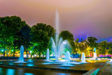 Night view of a fountain near the national theatre in Olso, Norwa