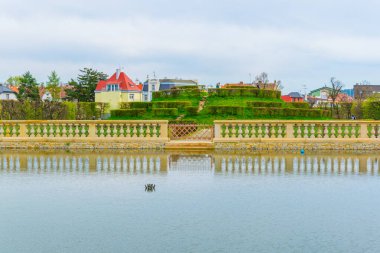 View of an artificial pond inside of the Kvetna zahrada garden in Kromeriz enlisted as the unesco world heritage site