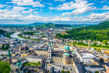 Aerial panoramic view of the historic city of Salzburg including Mirabell palace, the Salzburg cathedral and many churches
