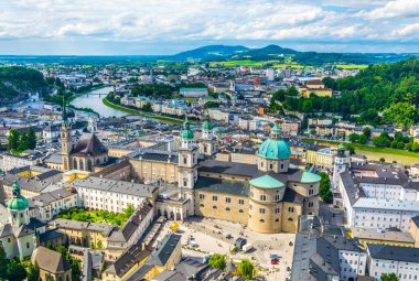 Aerial panoramic view of the historic city of Salzburg including Mirabell palace, the Salzburg cathedral and many churches