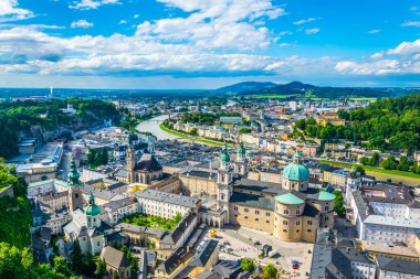 Aerial panoramic view of the historic city of Salzburg including Mirabell palace, the Salzburg cathedral and many churches
