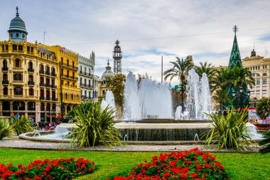 town hall in spanish city valencia hidden behind a fountain