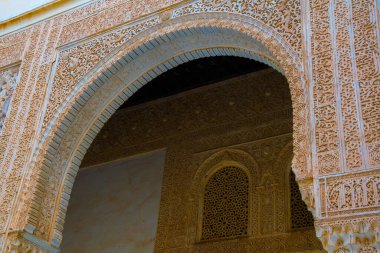 detail of a beautiful decoration of the alhambra palace in spain.